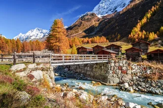 Photo art by Achim Thomae: autumn landscape in Lötschental with larches and river