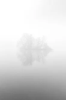Photo art by Nils Steiner: fog envelops a tranquil island in the lake