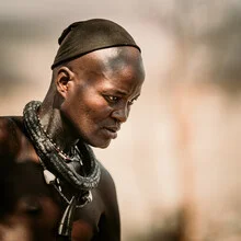 Photo art by Dennis Wehrmann: portrait of a Namibian man with a warm smile.