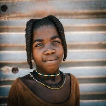 Photo art by Dennis Wehrmann: portrait of a young girl from Namibia with an emotional expression