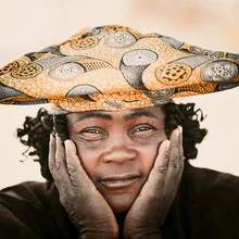 Photo art by Dennis Wehrmann: portrait of a Herero woman from Namibia displaying vivid emotions.