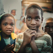 Portrait of a boy in Katutura, Namibia: captivating eyes and emotions.