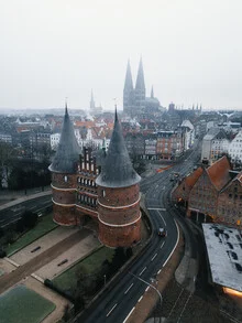 Photo art by Johannes Hulsch: chilly winter morning at Holstentor in Lübeck