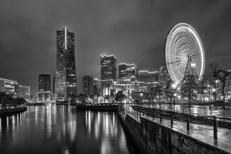 Night photo of Yokohama skyline featuring bright skyscrapers and harbor vibe
