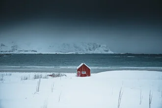 Photo art by Johannes Hulsch: red house by snow-covered sea in Norway