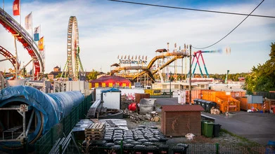 Photo art by Christoph Kalck: vibrant spring festival scene with Ferris wheel and rides