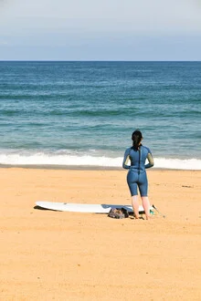Photo art by Lotte Wildiers: Surfer woman at Biarritz beach during sunset.