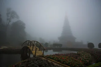 Photo art by Tanapat Funmongkol: mysterious pagoda in fog