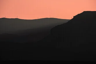 Photo art by Tal Paz-Fridman: gentle mountain silhouettes at sunset