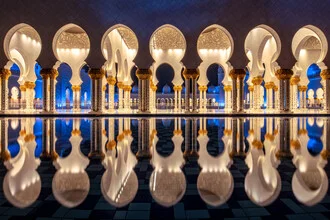 Photo art by Achim Thomae: Sheikh Zayed Mosque at night with reflection in water.