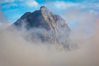 Photo art by Martin Wasilewski: fog envelops the peak of Selbhorn in the Alps.