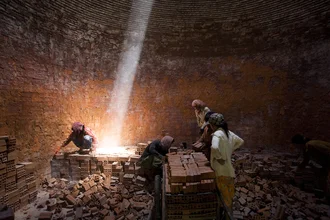 Photo art by Manuel Fischer: kiln with sunlight beams in Cambodia