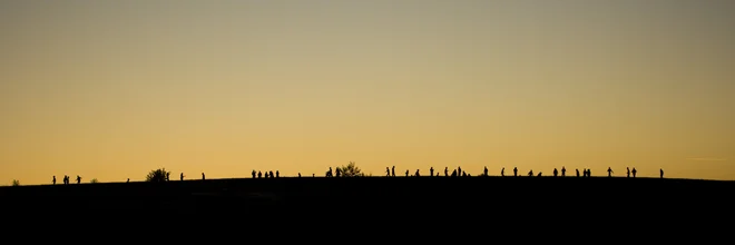 Photo art by Antonia Bartning: silhouettes of figures at sunset