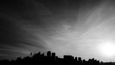 Photo art by Johannes Zakel: Sydney skyline in backlight, black-and-white style.