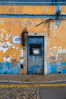 Colorful photo of a Portuguese door detail featuring architectural elements