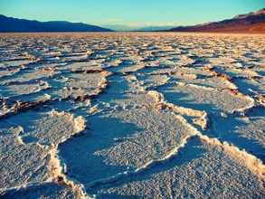 Photo art by Sonja Retzlaff: warm sunset over the desert with salt patterns