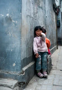 Charming scene of children in Beijing with joyful expressions and vibrant colors