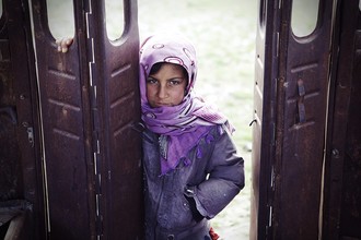 Rada Akbar, Girl stands outside of the ruined bus
