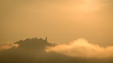 Photo art by Monika Schwager: Evening light over mountains and clouds