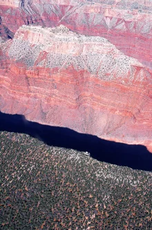 Photo art by Holger Ostwald: aerial view of the Grand Canyon with red and green layers.