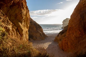 Photo art by Nicolas Delbrück: coastal landscape with rocks and sunset