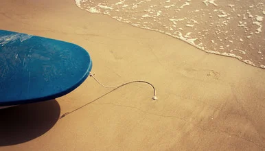 Photo art by Valentyn Kolesnyk: gentle traces in sand recalling a calm beach atmosphere