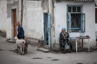 Photo art by Jeanette Dobrindt: People and sheep on the street in Bukhara, Uzbekistan.