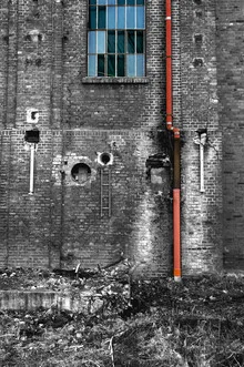 Photo art by Andreas Odersky: Old, dilapidated buildings in a calm blue and red color palette