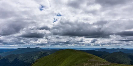 Photo art by Stefan Glatzel: soft clouds over Scottish Highlands