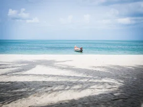 Photo art by Johann Oswald: beach with palms and longtail boat in Thailand