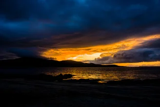 Photo art by Stefan Glatzel: softly glowing sunset over the Highlands