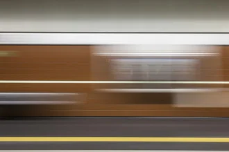 Photo art by Michael Meinhard: dynamic subway scene with elements of motion
