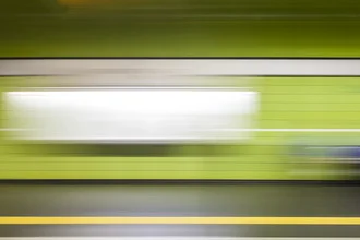 Abstract photo art: movement in a subway with dynamic colors and shapes