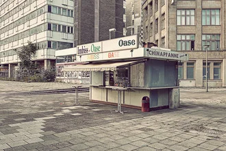 Photo art by Michael Belhadi: vibrant scene of a city window with a currywurst stand
