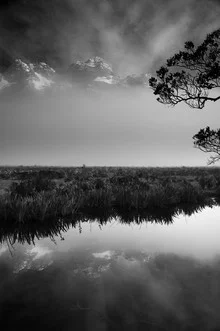 Photo art by Marcos Sobral: calm water surface reflecting mountains