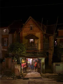 Photo art by Floriane De Lassee: traditional house in Antananarivo at night