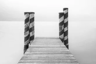 Photo art by Thomas Herzog: serene jetty at Lake Garda with mountains in the background