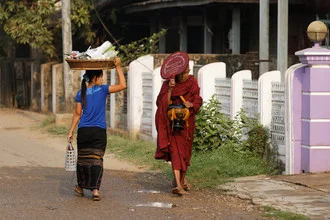 Gathering of monks in Myanmar, peaceful atmosphere, soft colors.
