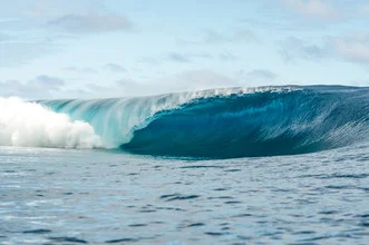 Photo art by Lars Jacobsen: a perfect wave in the clear blue ocean