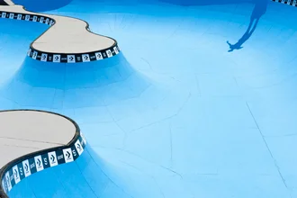 Skateboard photo art by Lars Jacobsen: action-filled scene at a pool in California