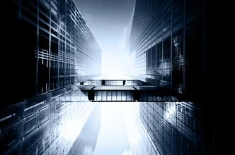 Photo art by Jochen Fischer: skyscraper with a blue facade under a clear sky