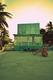 Beautiful photo art: gentle morning vibe with sand and architecture in Belize.