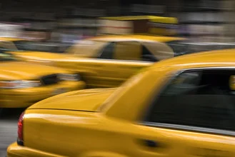 Photo art by Franzel Drepper: yellow cabs on a busy New York street