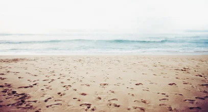 Photo art by Kevin Russ: Footprints on the calm Guadalupe Beach in California.