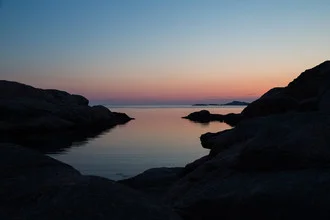 Photo art by Nicolas Delbrück: serene sunset over the Norwegian coast