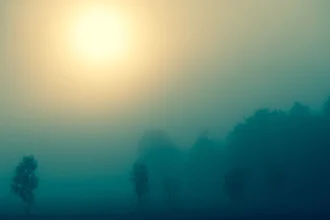 Photo art by Erwin Fischer: gentle sunrise over a misty landscape