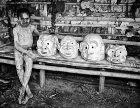 Portrait of an Asaro Mudboy from Papua New Guinea wearing a traditional mask