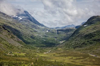 Photo art by Silvia Becker: view of a Norwegian valley with mountains and clouds.