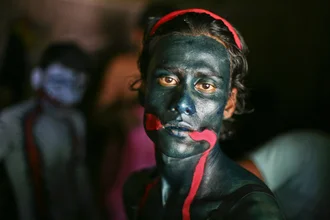 Photo art by Pranabesh Das: Devotee's faith during the Charak Puja ceremony