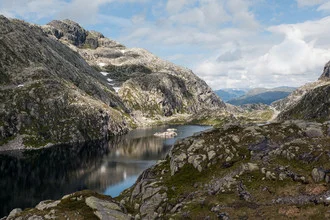 Photo art by Silvia Becker: tranquil Norwegian landscape with water and hills.